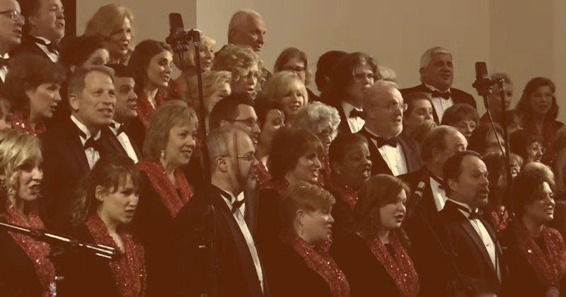 Mosaic choir singers performing on stage