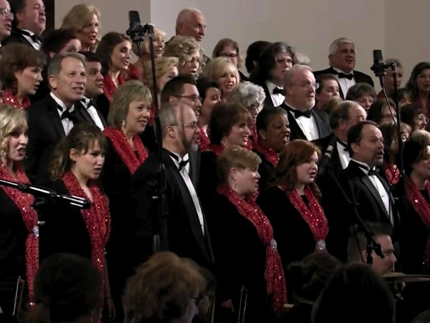 Mosaic choir singers performing on stage